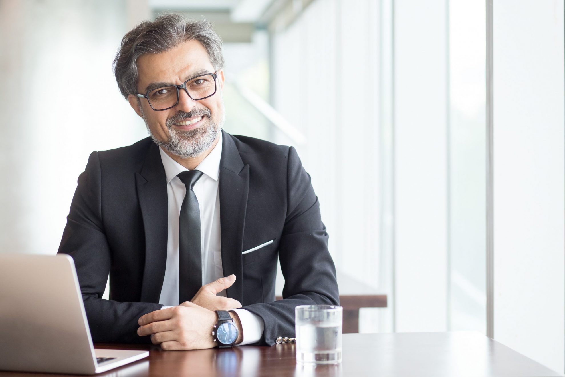 Photo of mature office worker illustrates blog: ``4 Tips to Combat Ageism in the Workplace``